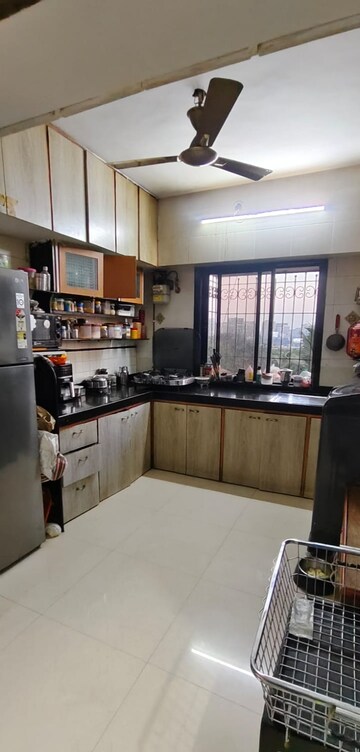 Kitchen in 2 BHK Apartment at Ratna Samuha CHS, Andheri West – for Rent