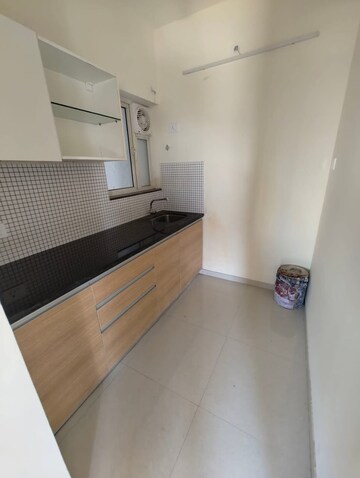 Kitchen in 2 BHK Apartment at Omkar Signet, Malad East – for Rent