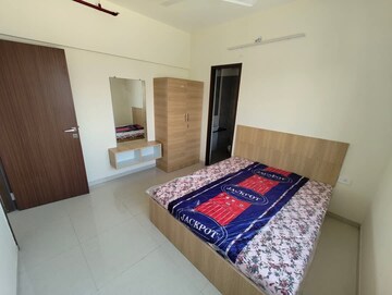Bedroom in 2 BHK Apartment at Omkar Signet, Malad East – for Rent