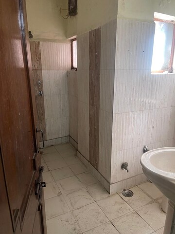 Bathroom in 2 BHK Apartment at Paschim Vihar – for Rent