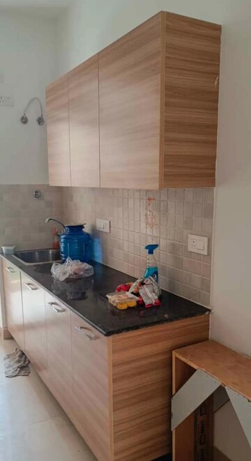 Kitchen in 2.5 BHK Apartment at ATS Happy Trails, Sector 10 Greater Noida – for Rent