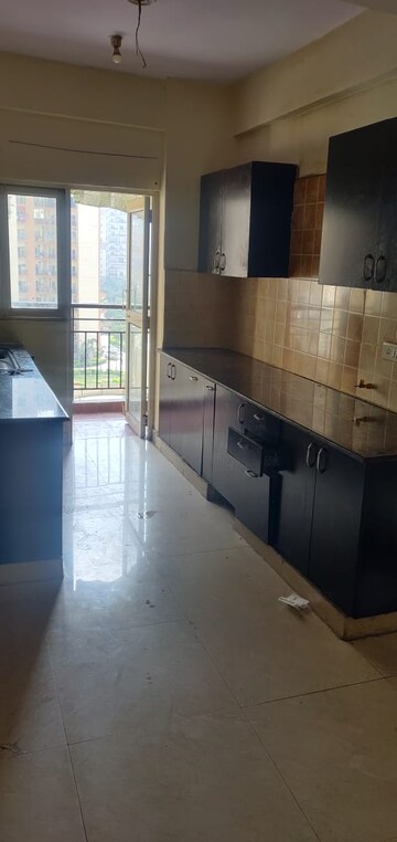 Kitchen in 2.5 BHK Apartment at Gardenia Golf City, Sector 75 – for Rent