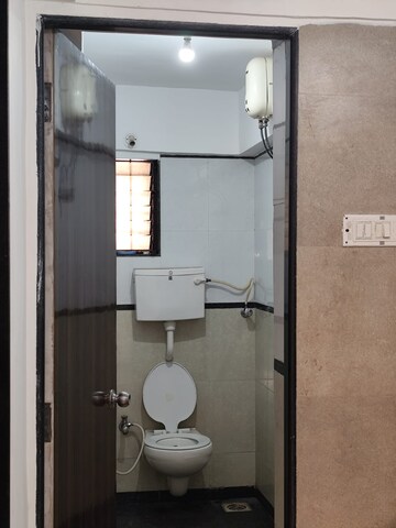 Bathroom in 2 BHK Apartment at Sadhana Chs Tilak Nagar, Tilak Nagar – for Rent