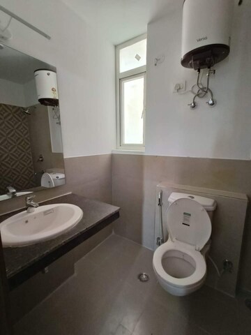 Bathroom in 3 BHK Apartment at ATS Happy Trails, Sector 10 Greater Noida – for Rent