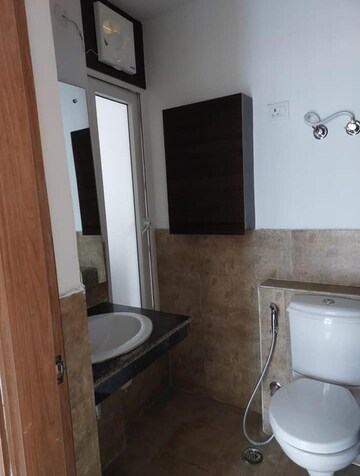 Bathroom in 3 BHK Apartment at ATS Happy Trails, Sector 10 Greater Noida – for Rent