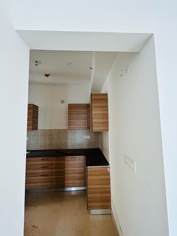 Kitchen in 3 BHK Apartment at ATS Happy Trails, Sector 10 Greater Noida – for Rent