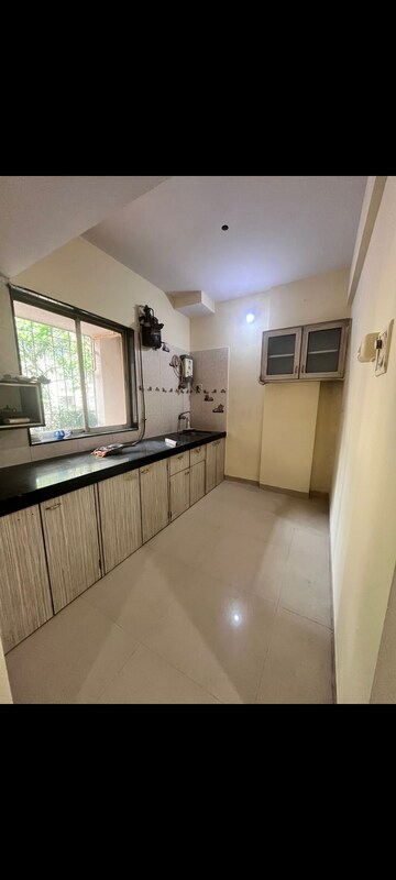 Kitchen in 2 BHK Apartment at Dream Shubhamkaroti CHS, Bhaskar Colony – for Rent