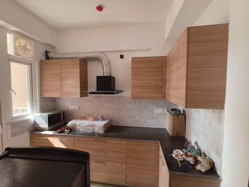 Kitchen in 3 BHK Apartment at ATS Happy Trails, Sector 10 Greater Noida – for Rent