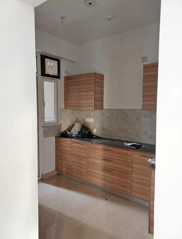 Kitchen in 3 BHK Apartment at ATS Happy Trails, Sector 10 Greater Noida – for Rent