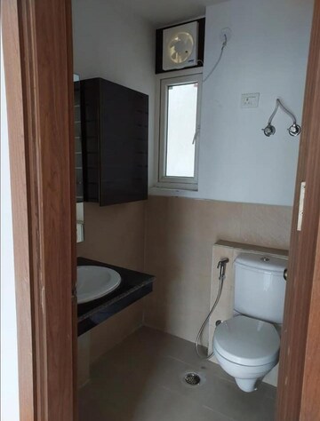 Bathroom in 3 BHK Apartment at ATS Happy Trails, Sector 10 Greater Noida – for Rent