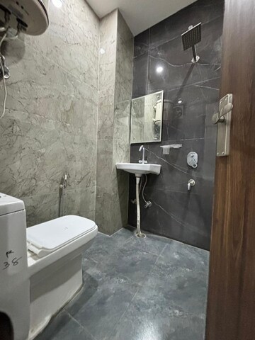 Bathroom in 3 BHK Builder Floor at Freedom Fighters Enclave – for Rent