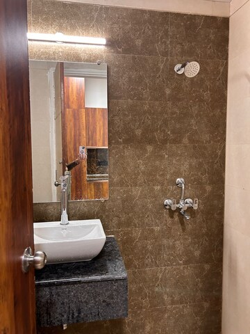 Bathroom in 3 BHK Apartment at ATS Happy Trails, Sector 10 Greater Noida – for Rent