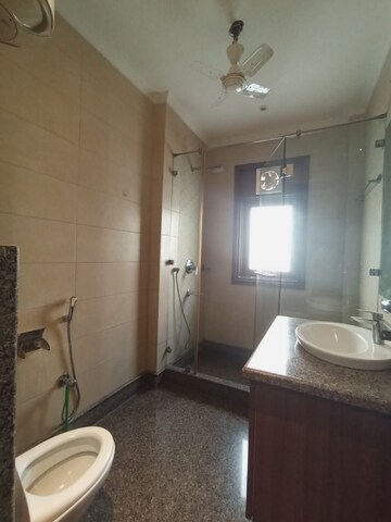 Bathroom in 3 BHK Builder Floor at Pamposh Enclave – for Rent