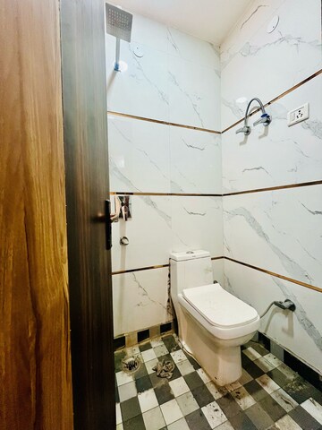 Bathroom in 2 BHK Builder Floor at Dwarka Mor – for Rent