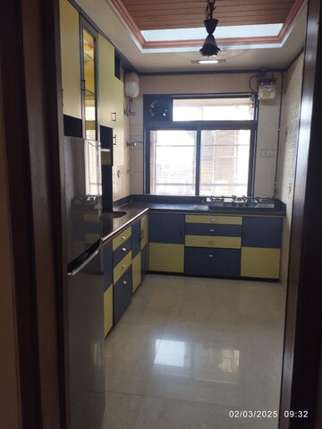 Kitchen in 2 BHK Apartment at Lokhandwala Residency, Worli – for Rent