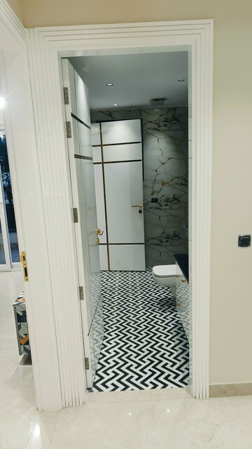 Bathroom in 4 BHK Builder Floor at Harsha City Mall, Shakti Khand 2 – for Sale