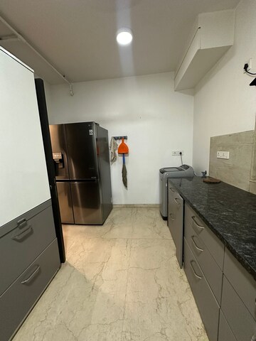Kitchen in 3 BHK Apartment at Oberoi Realty Esquire, Goregaon East – for Rent