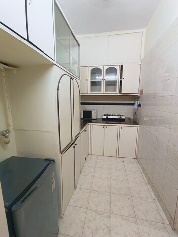 Kitchen in 1 BHK Apartment at Colaba – for Rent