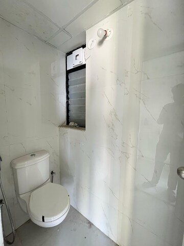 Bathroom in 1 BHK Apartment at Runwal Gardens Phase I, Dombivli East – for Rent