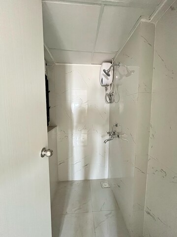Bathroom in 1 BHK Apartment at Runwal Gardens, Dombivli East – for Rent