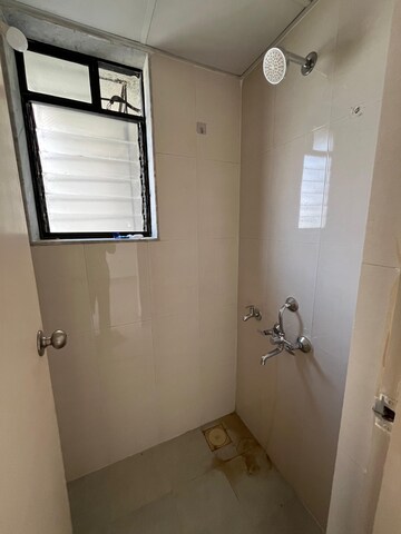Bathroom in 1 BHK Apartment at Lodha Golden Dream, Dombivli East – for Rent