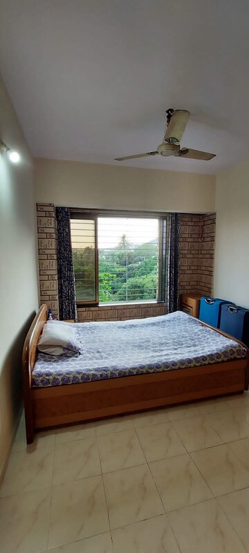 Bedroom in 2 BHK Apartment at Vasant Garden, Mulund West – for Sale