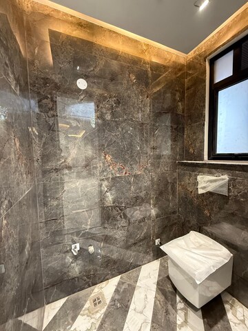 Bathroom in 4 BHK Builder Floor at Srishti Greenfield Homes, Green Fields Colony – for Sale