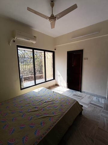 Bedroom in 2 BHK Apartment at Omkar Alta Monte, Malad East – for Rent