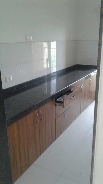 Kitchen in 2 BHK Apartment at Lodha Luxuria, Majiwada – for Rent