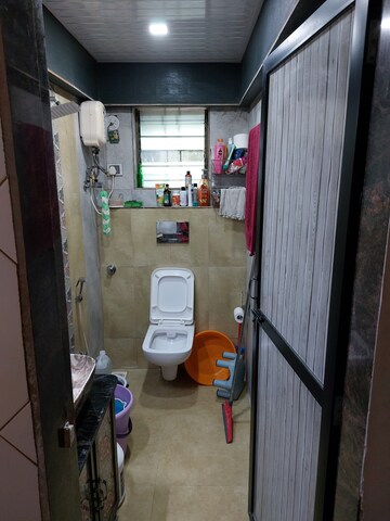 Living Room in 1 BHK Apartment at Kanchan Janga CHS, Kopar Khairane – for Sale