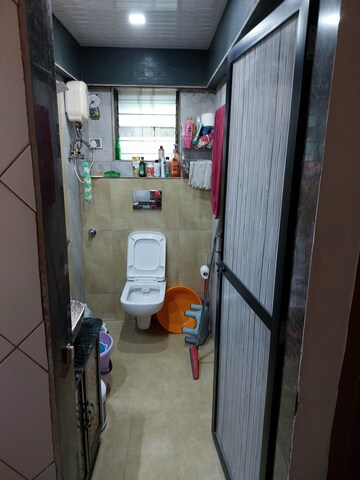 Kitchen in 1 BHK Apartment at Kanchan Janga CHS, Kopar Khairane – for Sale