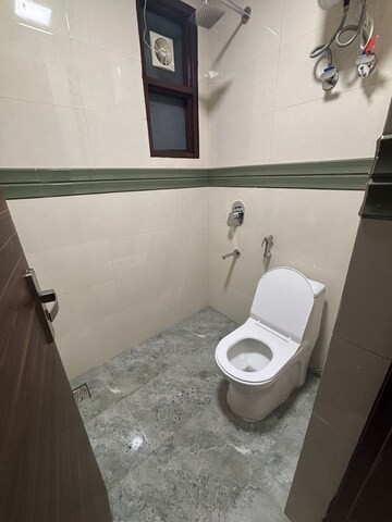 Bathroom in 3 BHK Builder Floor at Ansal Sushant Lok I, Sector 43 – for Rent