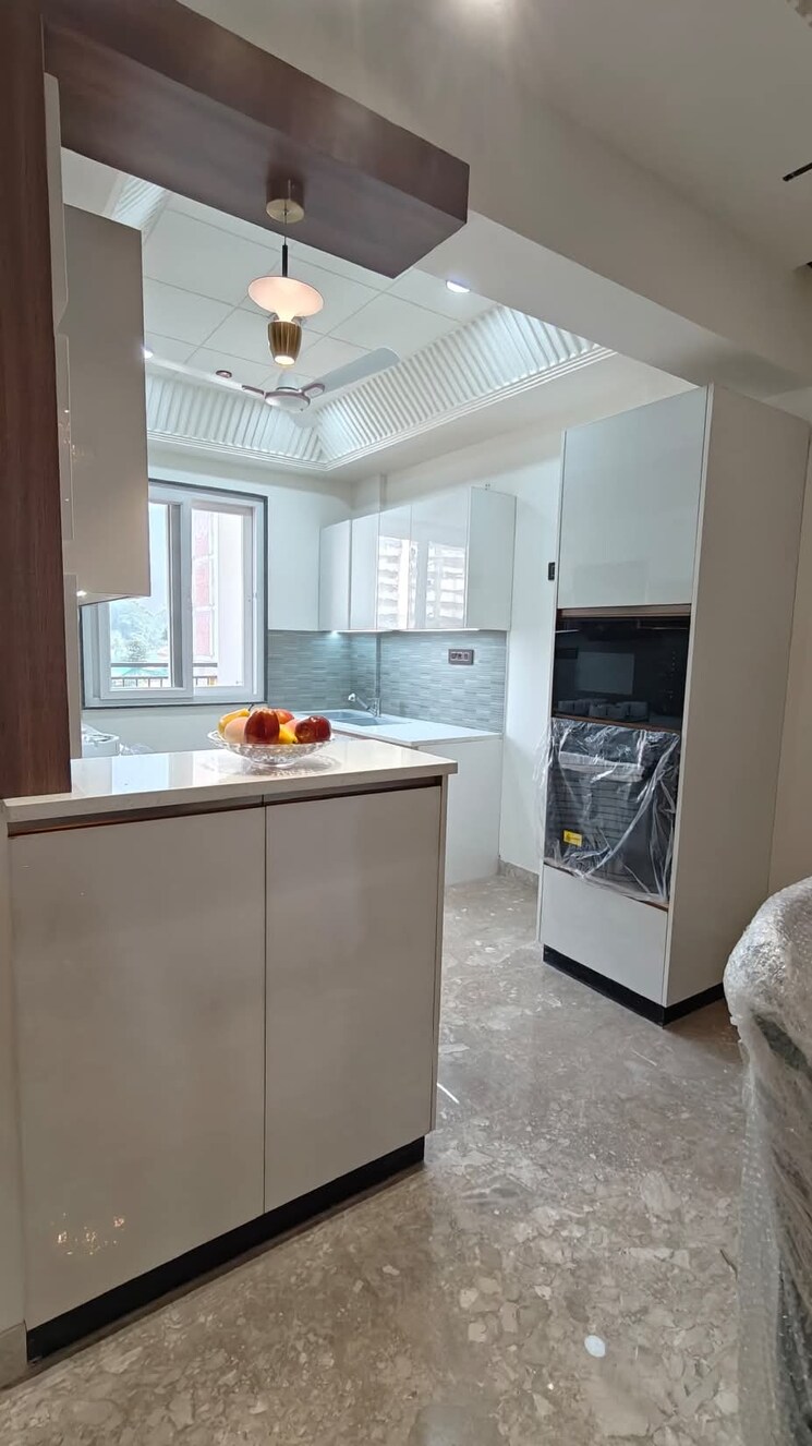 Kitchen, bptp-amstoria-country-floor 3 Bedroom 2025 Sq.Ft. Builder Floor In Sector 102 Gurgaon 8294065