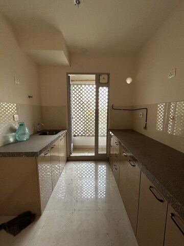 Kitchen in 2 BHK Apartment at Ashar Axis, Majiwada – for Sale