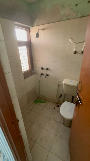 Bathroom in 2.5 BHK Apartment at Royal Garden Estate, Sector 61 – for Sale