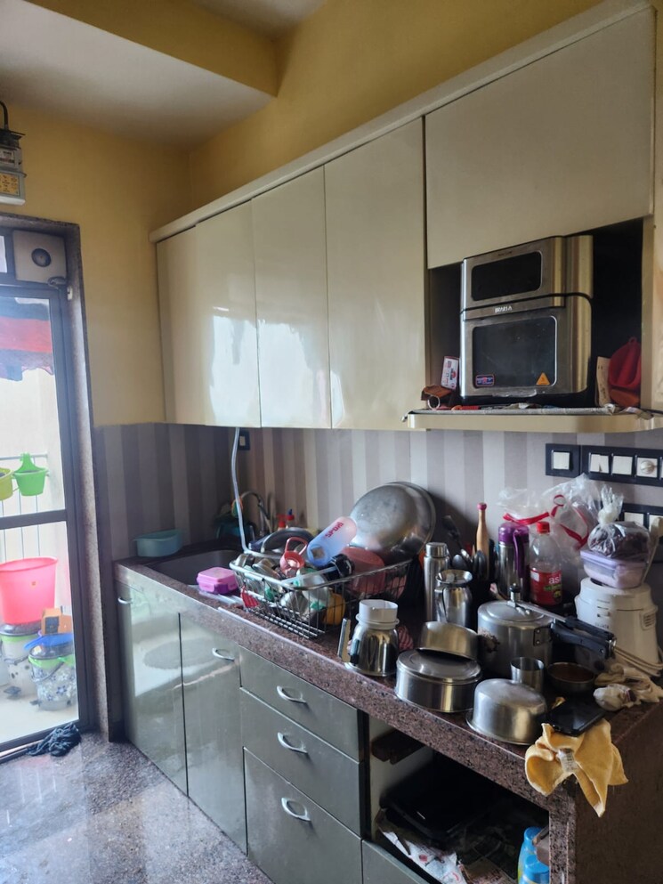 Kitchen, kalpataru-sunrise-grande 3 Bedroom 1055 Sq.Ft. Apartment In Kolshet Road Thane 8294386