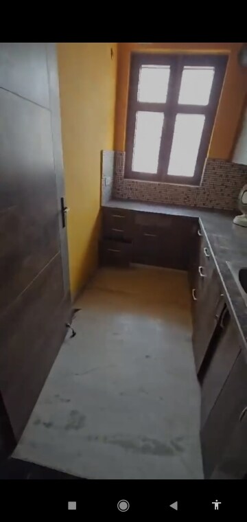 Kitchen in 1.5 BHK Apartment at Noida Authority Apartment, Sector 99 – for Sale