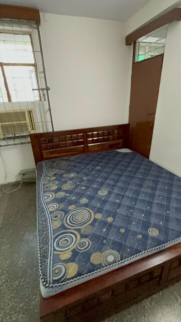 Bedroom in 2 BHK Apartment at Dhawal Giri Apartment, Sector 34 – for Rent