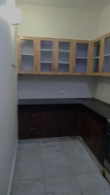 Kitchen in 2 BHK Apartment at Arun Vihar, Sector 29 – for Sale
