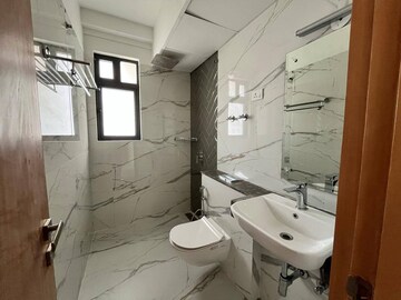 Bathroom in 3 BHK Apartment at Shapoorji Pallonji Joyville Gurgaon, Sector 102 – for Rent
