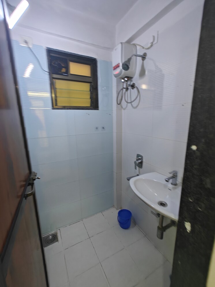 Bathroom, ishwar-iris 1 Bedroom 650 Sq.Ft. Apartment In Seawoods Navi Mumbai 8294714