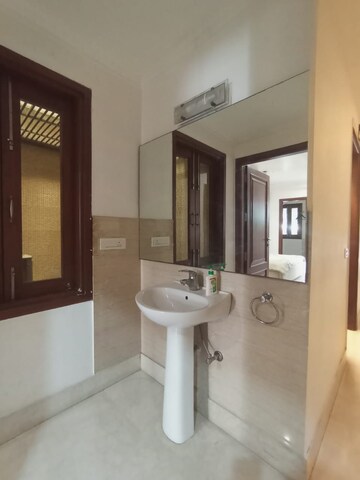 Bathroom in 3 BHK Builder Floor at Pamposh Enclave – for Rent