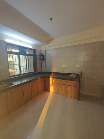 Kitchen in 3 BHK Apartment at Jay Balaji CHS, Nerul Sector 6 – for Sale
