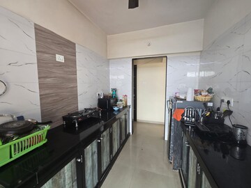 Kitchen in 2 BHK Apartment at Sagar City Indian Ocean C, Andheri West – for Rent