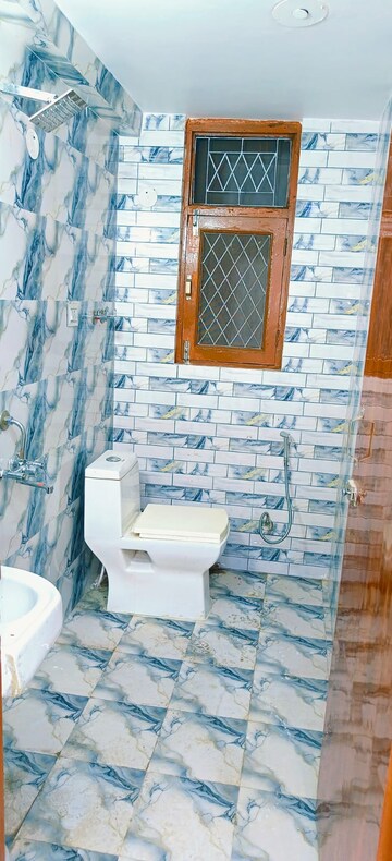 Bathroom in 2 BHK Apartment at Shaheen Bagh – for Sale