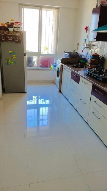 Kitchen in 1.5 BHK Apartment at Puranik Rumah Bali, Ghodbunder Road – for Sale
