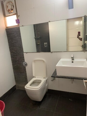 Bathroom in 4 BHK Apartment at Goyal Intercity, Memnagar – for Rent