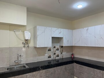 Kitchen in 4 BHK Apartment at Garur Golf Island, Sector 19b Dwarka – for Rent
