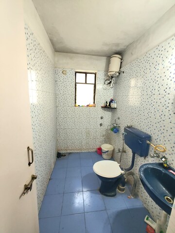 Bathroom in 3 BHK Apartment at Ruikar Akashganga, Aundh – for Rent