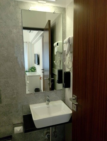Bathroom in 2 BHK Apartment at Omkar Signet, Malad East – for Rent